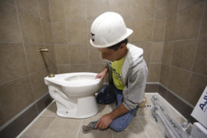 toilet flange repair: install the toilet