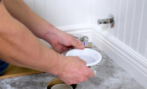 toilet flange replacement: drain the toilet